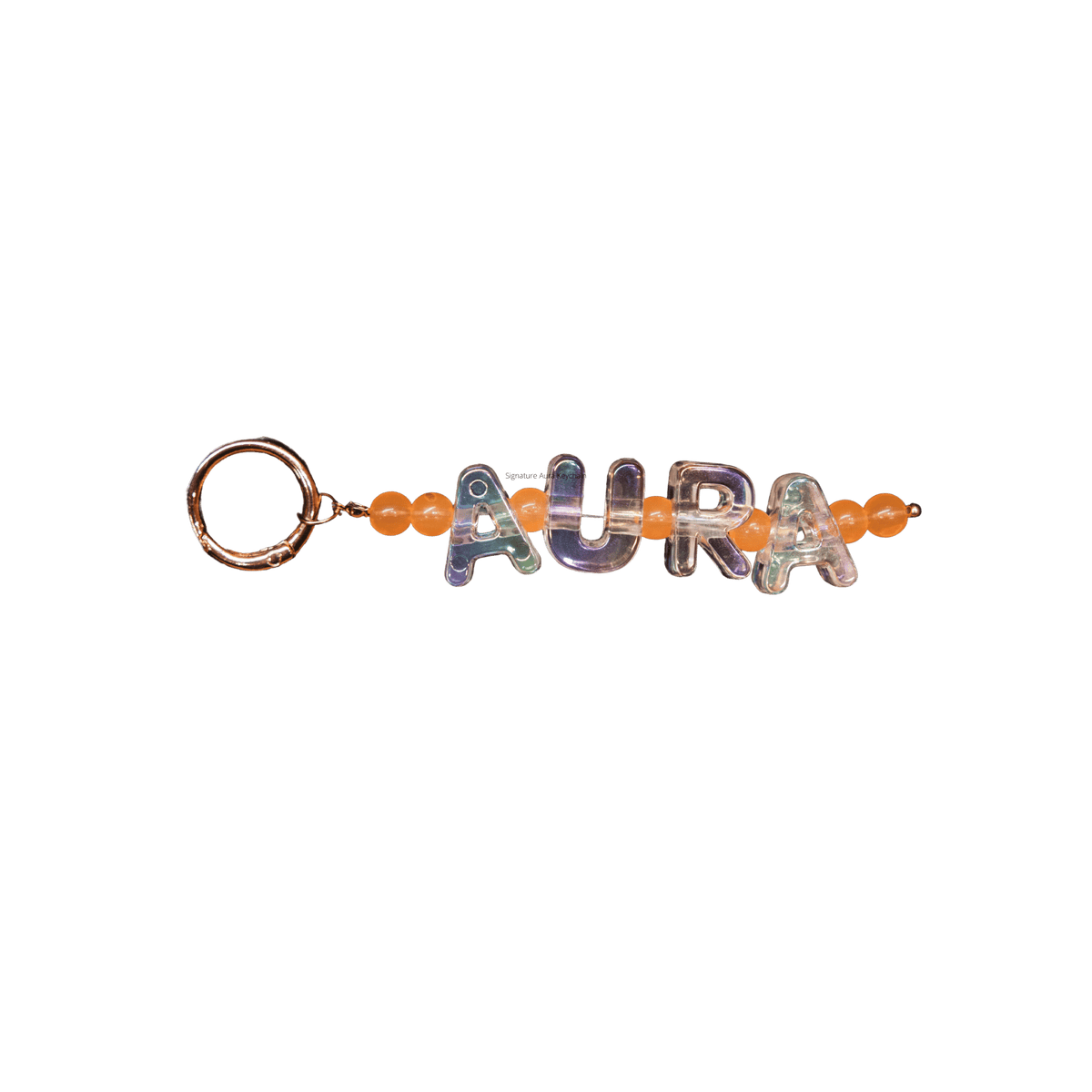 Keychain with 'AURA' letters 